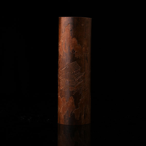 This is a bamboo house tea measure carved from bamboo.