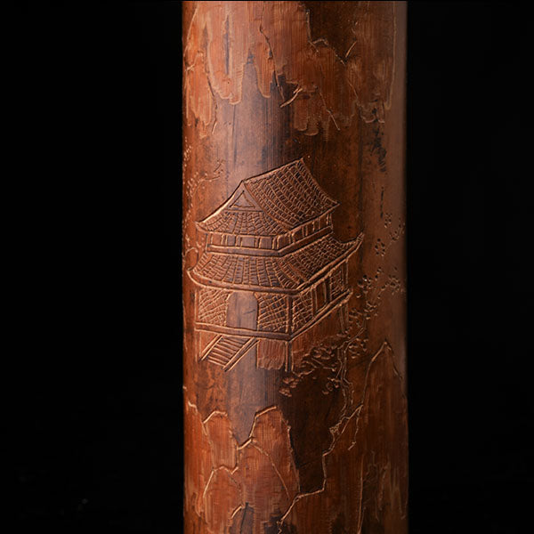 This is a bamboo house tea measure carved from bamboo.