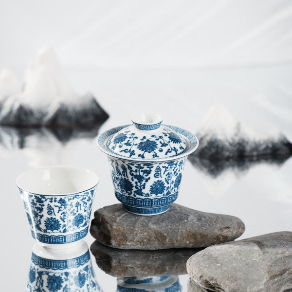 This is a lotus blue and white porcelain Gaiwan.