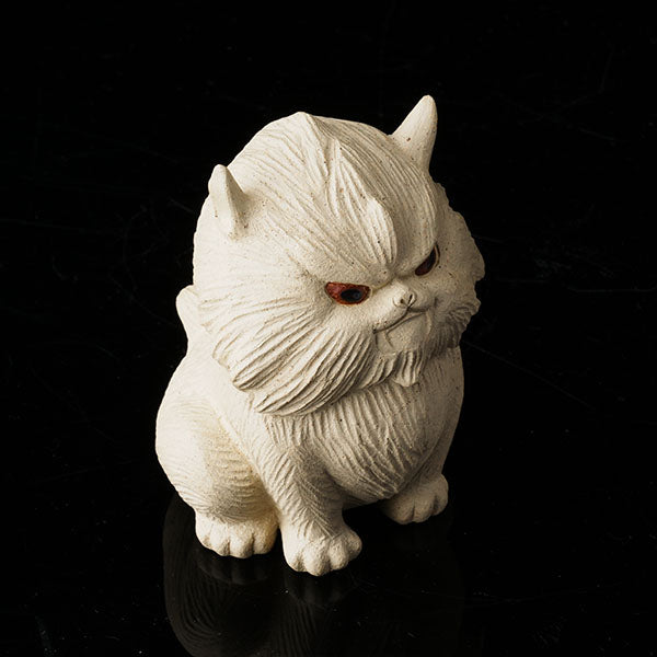 Cat at Night Tea Pet - Hand - crafted ceramic figurine resembling a cat, with a textured, fluffy appearance. Its eyes have a striking red hue, giving it an alluring "night - like" look. Ideal as a tea pet, this piece adds an artistic and mysterious touch to tea - related settings. Perfect for collectors of unique tea accessories, highlighting fine craftsmanship and an intriguing nocturnal theme.