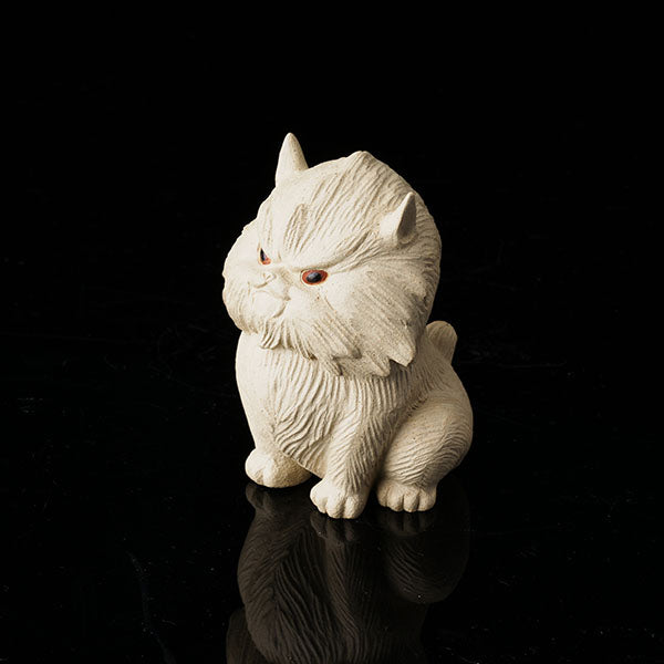 Cat at Night Tea Pet - Hand - crafted ceramic figurine resembling a cat, with a textured, fluffy appearance. Its eyes have a striking red hue, giving it an alluring "night - like" look. Ideal as a tea pet, this piece adds an artistic and mysterious touch to tea - related settings. Perfect for collectors of unique tea accessories, highlighting fine craftsmanship and an intriguing nocturnal theme.