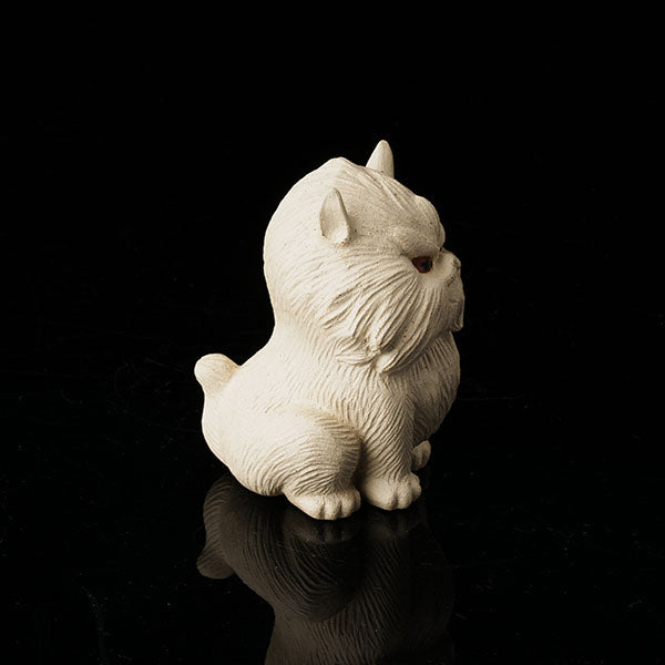 Cat at Night Tea Pet - Hand - crafted ceramic figurine resembling a cat, with a textured, fluffy appearance. Its eyes have a striking red hue, giving it an alluring "night - like" look. Ideal as a tea pet, this piece adds an artistic and mysterious touch to tea - related settings. Perfect for collectors of unique tea accessories, highlighting fine craftsmanship and an intriguing nocturnal theme.