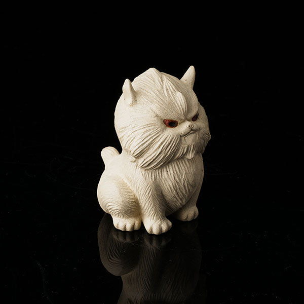 Cat at Night Tea Pet - Hand - crafted ceramic figurine resembling a cat, with a textured, fluffy appearance. Its eyes have a striking red hue, giving it an alluring "night - like" look. Ideal as a tea pet, this piece adds an artistic and mysterious touch to tea - related settings. Perfect for collectors of unique tea accessories, highlighting fine craftsmanship and an intriguing nocturnal theme.