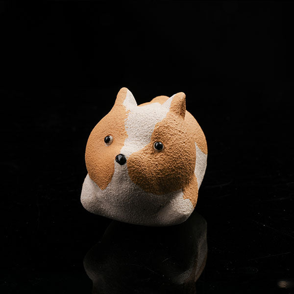 This is a running Corgi tea pet.