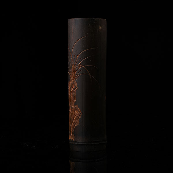 This is a bamboo tea measure carved from bamboo.