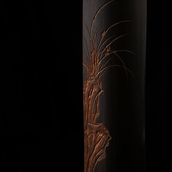 This is a bamboo tea measure carved from bamboo.