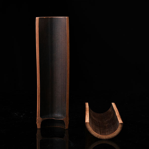 This is a bamboo tea measure carved from bamboo.