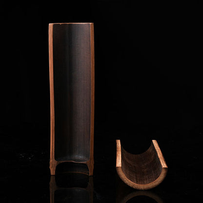 This is a bamboo tea measure carved from bamboo.