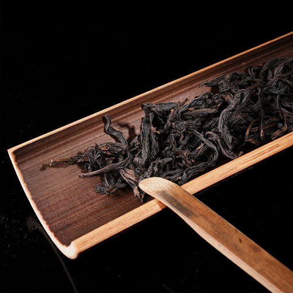 This is a bamboo tea measure carved from bamboo.