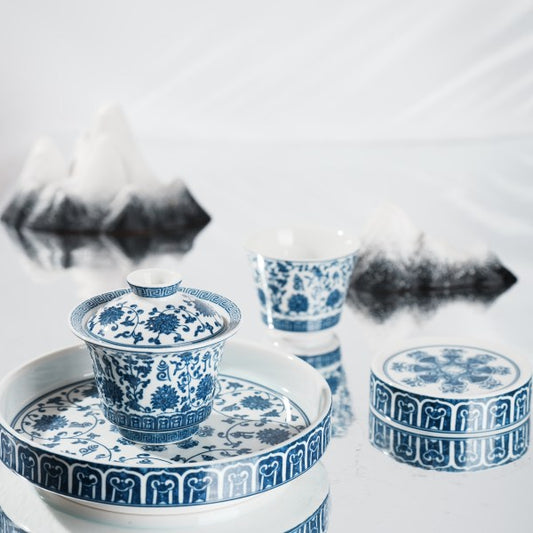 This is a lotus blue and white porcelain Gaiwan.