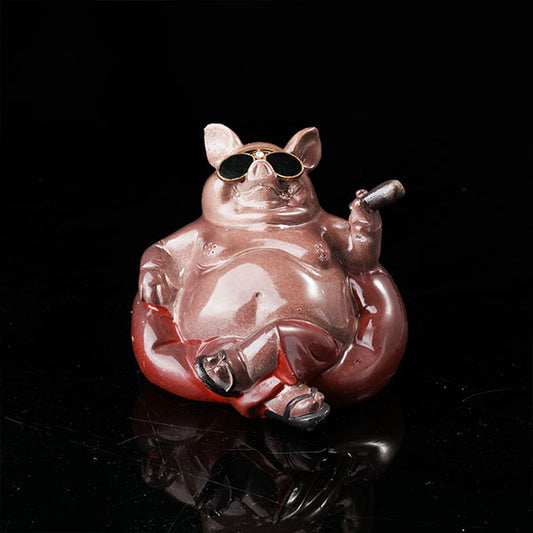 Bully pig sitting on sofa, wearing sunglasses and smoking cigar.