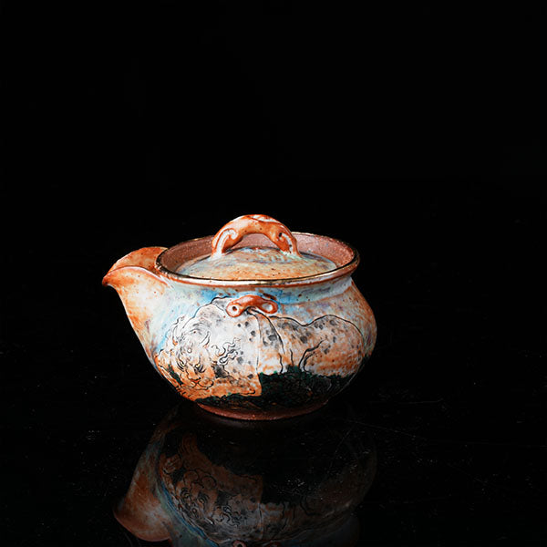 Classic of Mountains and Seas Teapot - Traditional ceramic teapot with rustic glaze, featuring mythical creature motifs inspired by Shan Hai Jing. Handcrafted, earthy tones, lid with handle, ideal for tea rituals. Showcases cultural artistry, intricate detailing, and functional elegance. Perfect for collectors of unique teaware, blending mythology with craftsmanship. 