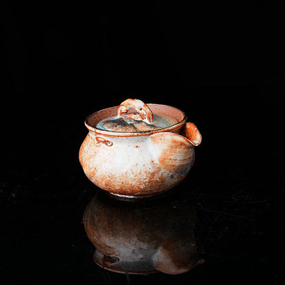 Classic of Mountains and Seas Teapot - Traditional ceramic teapot with rustic glaze, featuring mythical creature motifs inspired by Shan Hai Jing. Handcrafted, earthy tones, lid with handle, ideal for tea rituals. Showcases cultural artistry, intricate detailing, and functional elegance. Perfect for collectors of unique teaware, blending mythology with craftsmanship. 