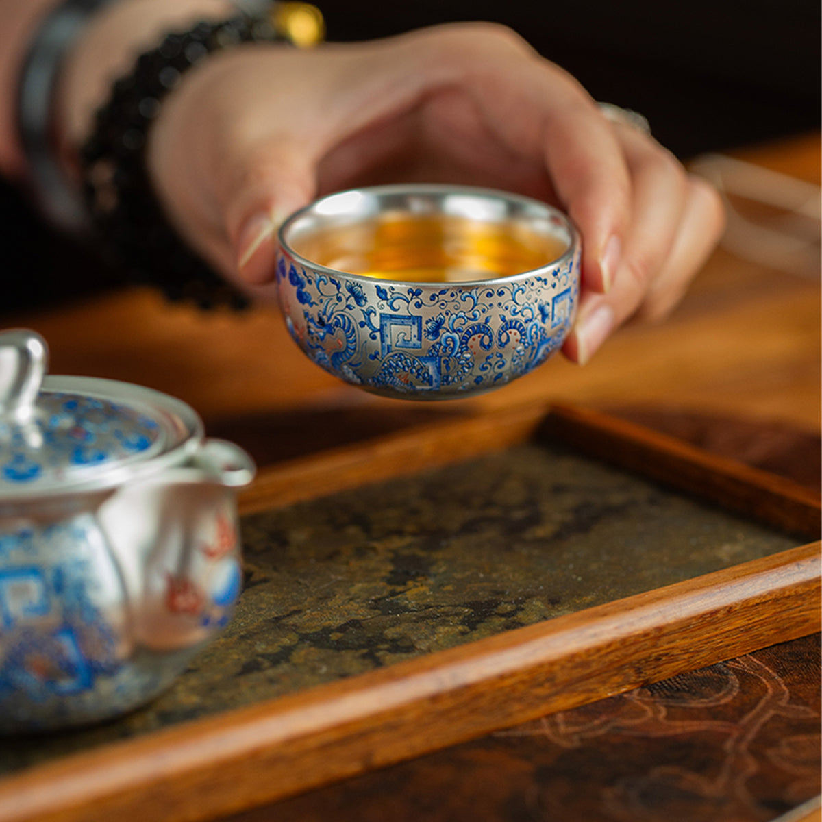 Gilded-silver twin dragons playing with a pearl Chaliland