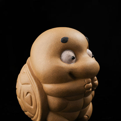 This is a cute little turtle tea pet.