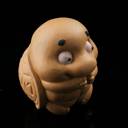 This is a cute little turtle tea pet.