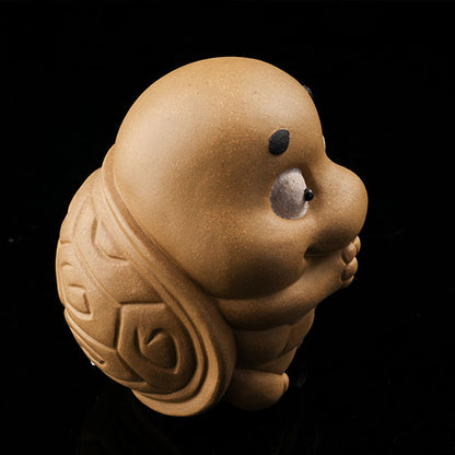 This is a cute little turtle tea pet.