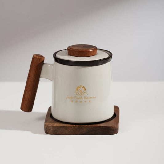 This is a cute ceramic travel set with a panda pattern and the brand logo on the cup.