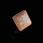 The Buddha without Form Square Teapot - Traditional ceramic teapot with square form, speckled brown glaze, gold handle, and relief figures (possibly Buddhist motifs). Handcrafted, rustic design, ideal for tea rituals. Features intricate detailing, cultural artistry, and functional elegance. Perfect for collectors of unique teaware, highlighting craftsmanship and traditional aesthetics.