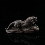 This is a tiger tea pet ready to go hunting.