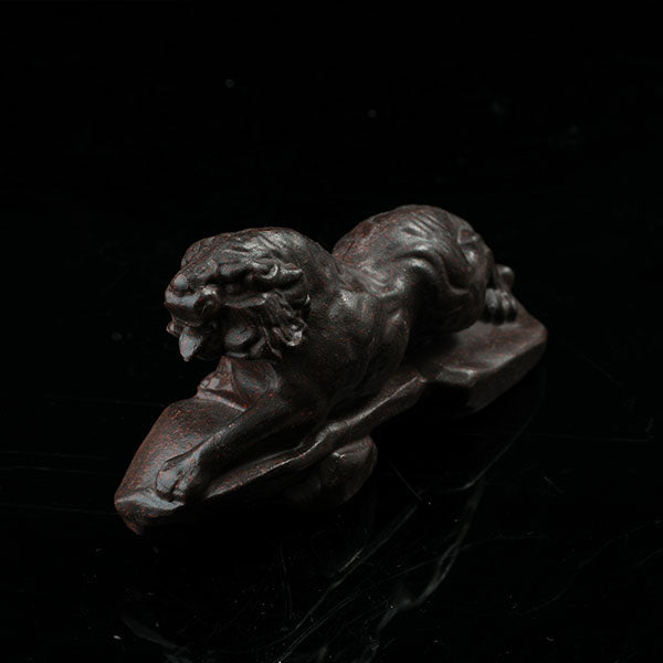 This is a tiger tea pet ready to go hunting.