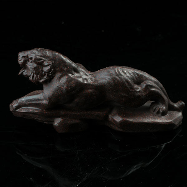 This is a tiger tea pet ready to go hunting.