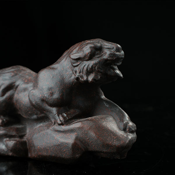 This is a tiger tea pet ready to go hunting.