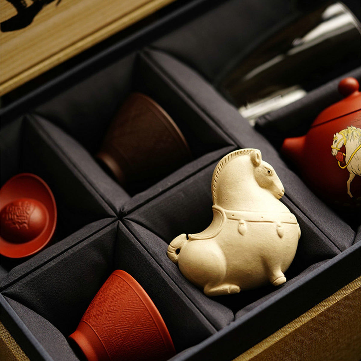 White Horse Xi Shi teapot, two teacups, two tea pets and one teacup. Chaliland